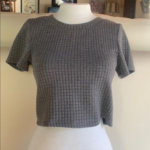 Grey textured crop top with zipper in back